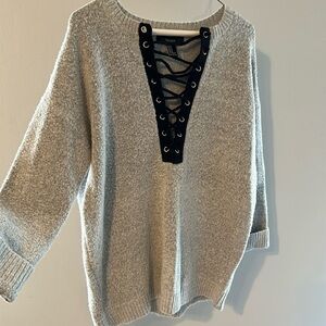 Forever 21 gray sweater with black lace up on the front. Super comfortable.